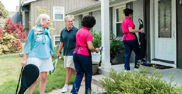 Molly Maids walking into a home with their customer's leaving to play tennis.